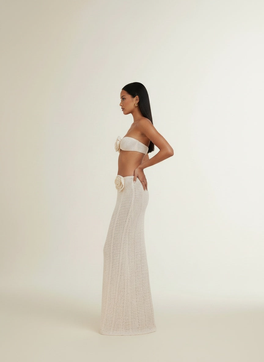 Side profile of the model wearing Women's Solid Color Knitted Crocheted Beach Bikini Swimsuit Blouse Sun-proof Set